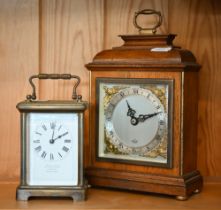 A brass carriage clock a/f, to/w an Elliott walnut mantel clock (2)