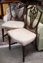 A pair of Hepplewhite style mahogany shield back dining chairs