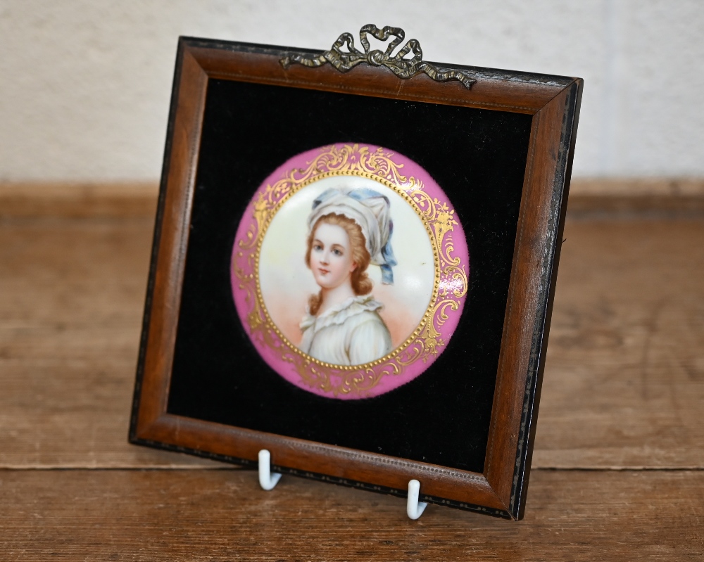 A Sevres porcelain roundel, painted with 'Madame Elizabeth de France' within rose Pompadore and gilt