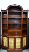 A Federal style mahogany bookcase desk with pen shelves around fall front panel enclosing fitted