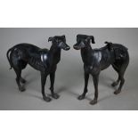 A pair of painted cast iron lurchers, 30 x 36 cm approx