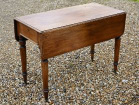 A Victorian mahogany drop leaf Pembroke table, drawer to one end and raised on turned legs on