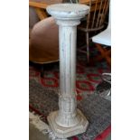 A carved wood classical pillar pedestal with distressed paint finish, 94cm high, to/w two folding