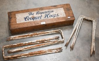 A boxed set of six vintage 'The Regulation Croquet Hoops' by F H Ayres Ltd, London; lot includes a
