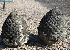 A pair of weathered cast stone pineapple finials, 35 cm h (2)