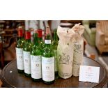 Nine bespoke (empty) bottles of Chateau Mouton Rothschild, Pauillac 1977, supplied to HM Queen