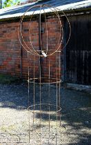 A weathered steel sweet pea garden frame with separate sphere top (2)