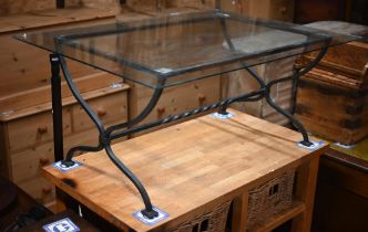 An artisan wrought steel framed glass top coffee table, 11/5 cm x 81.5 cm x 50 cm h