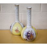 A pair of Victoria (Carlsbad, Austria) ceramic bottle vases in the Dresden manner printed with
