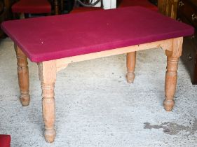 A pine workshop/crafting table with magenta baize covered top and turned legs, 140 x 86 x 78 cm h