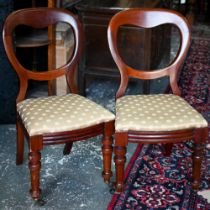A set of six late 19th/20th century mahogany balloon back dining side chairs, with fabric seats (6)
