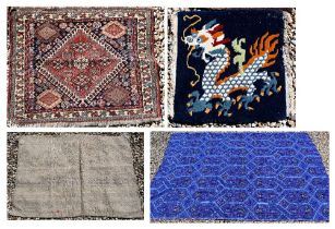 A Persian Quashqai bag face to/w Peking 'dragon' mat, fragment of blue fabric and hessian cushion