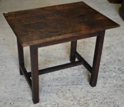 An 18th century Provincial oak rectangular side table on square supports united by stretchers, 80