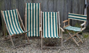 Three vintage green-striped deckchairs to/with a conforming folding table (4)