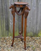 A mahogany jardiniere stand on carved horse-head monopodia supports a/f, 110 cm h