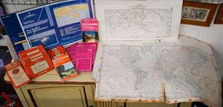 A quantity of vintage and later Ordnance Survey folding maps to/w various maritime charts etc