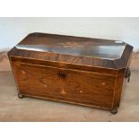 A large 19th century inlaid rosewood sarcophagus tea caddy with two bone-handled covered inner