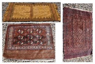 An small antique Turkoman rug, 122 cm x 78 cm to/w a Turkoman bag face, 97 cm x 84 cm and a camel