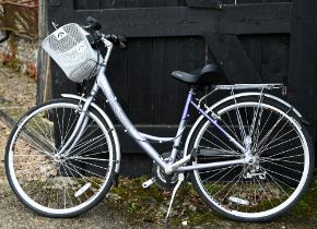 A ladies Raleigh Airline bicycle with manual and tools in the fitted shopper basket to/w a Pioneer