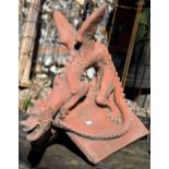 A cast terracotta dragon ridge tile, 65 cm h