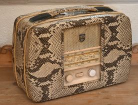 A vintage simulated snakeskin Ultra Twin-Deluxe wireless set, with sliding shutter front, 28 x 36 cm