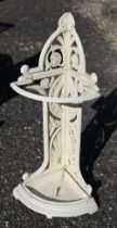 A painted cast iron corner stick stand, 74 cm high