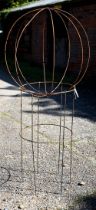 A small weathered steel sweet pea garden frame with separate sphere top (2)
