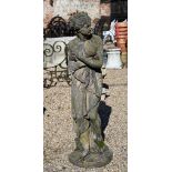 A classically styled weathered cast stone garden figure, 117 cm h