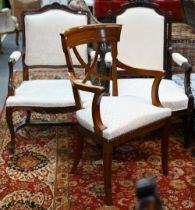 Three differing continental carved walnut framed and fabric panelled salon open armchairs (3)