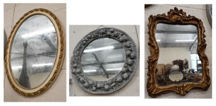 French oval mirror in painted and gilded foliate frame, 67 x 53 cm to/w circular mirror in painted