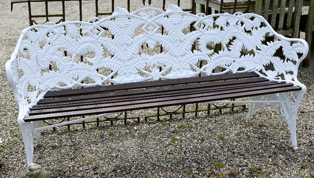 An old Coalbrookdale style cast iron blackberry and fern pattern bench, with wood-slat seat, 190