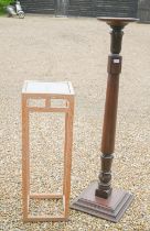 A mahogany jardiniere stand with turned and carved column on square platform base, 150 cm h to/w a