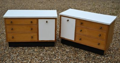 A handed pair of low 1950s bedside cabinets, melamine and beech, each 89 cm x 41 cm x 58 cm h, by