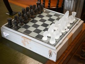 A set of Czechoslovakian frosted glass chessmen in case c/w chessboard Case a/f