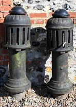 Ham Baker & Co, Westminster S.W., a pair of substantial cast iron bollard form ventilators, with