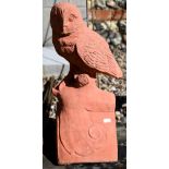 A cast terracotta owl ridge tile, 43 cm h