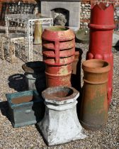 Six assorted old terracotta / pottery chimney pots, the tallest 115 cm h to/with a pair of of
