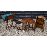 A small mahogany folding games table to/w two tripod occasional tables, a small oak bookcase, nest