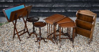 A small mahogany folding games table to/w two tripod occasional tables, a small oak bookcase, nest