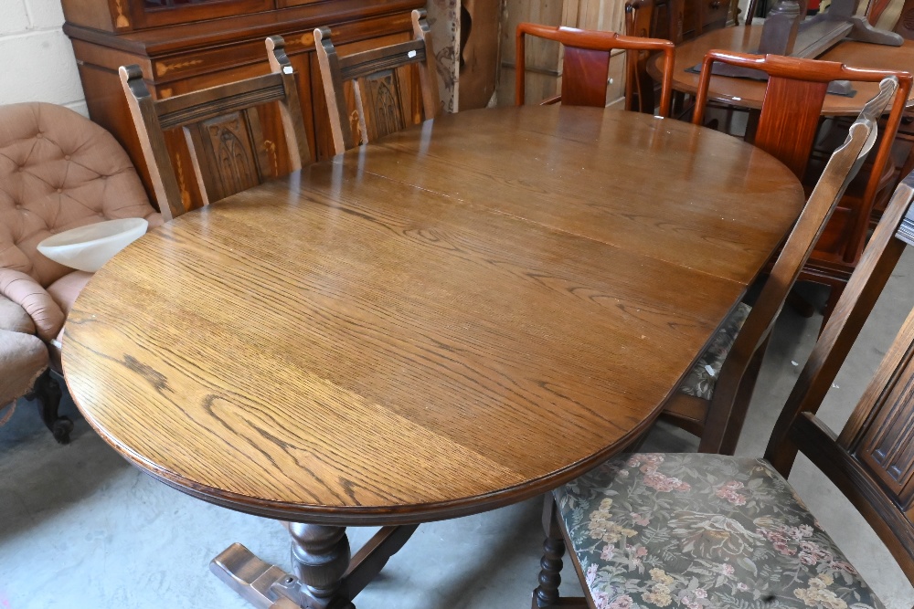 A 'Wood Brothers' Old Charm extending dining table with leaf, on turned pillars tied with a - Image 4 of 6