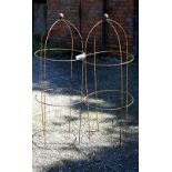 A pair of weathered steel ball head obelisk plant frames (2)