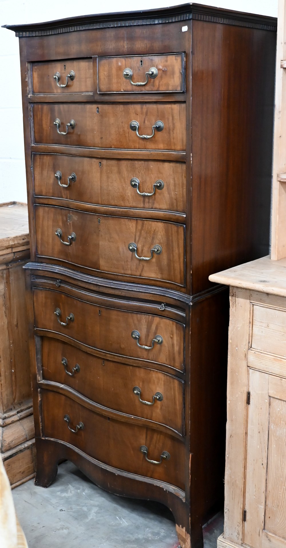 A Georgian style mahogany serpentine front chest on chest, 74 x 50 x 162 cm high