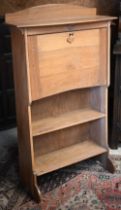 A light oak Arts & Crafts style bureau/student's desk, 74 x 25 x 122 cm h