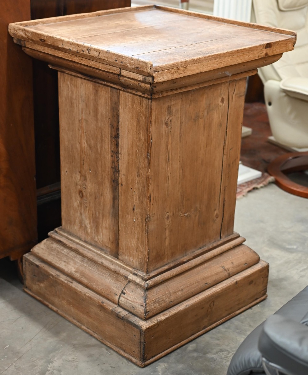 A large waxed pine square pedestal/stand 62 x 62 x 94 cm high