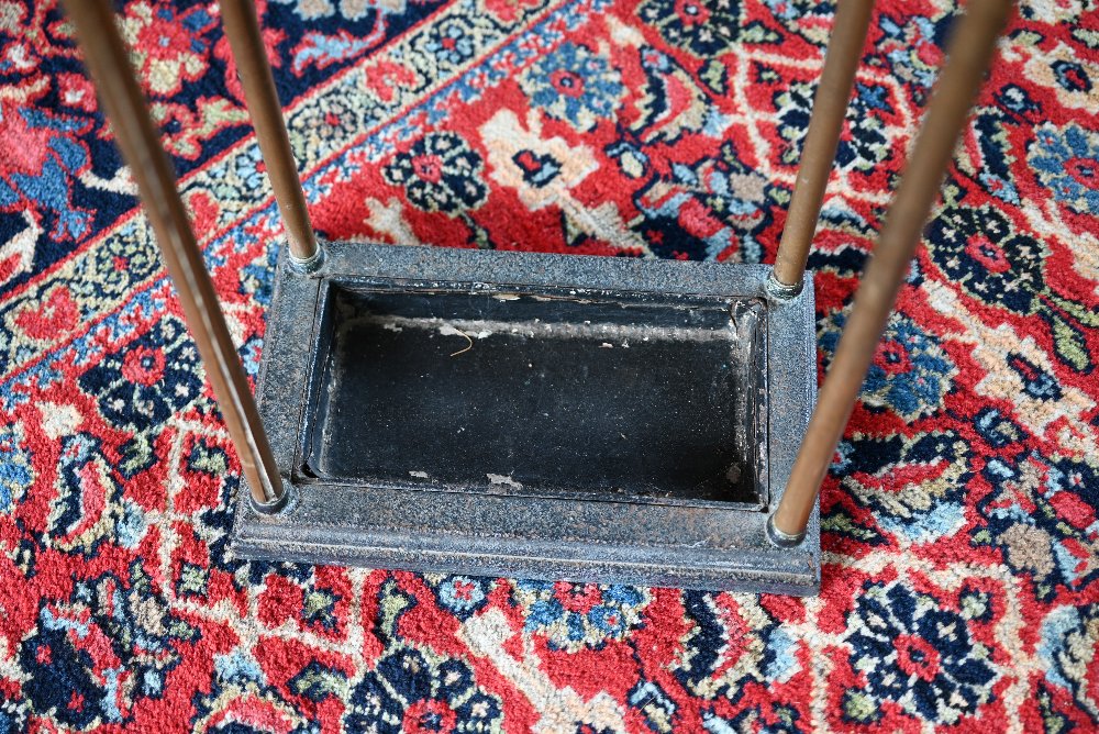 An antique six division brass stick-stand with cast iron base, 32 cm x 18 cm x 64 cm h - Image 2 of 3