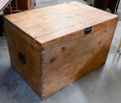 An antique pine trunk with iron side handles, 92 x 60 x 58 cm high