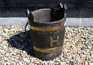 A 19th century coopered oak well bucket with brass branding and letter 'H', 37 cm high
