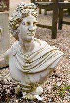 A cast stone garden bust of Caesar, 50 cm h, socle damaged