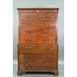 An associated two part George III mahogany chest on chest, the upper chest with canted pilasters,
