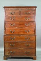 An associated two part George III mahogany chest on chest, the upper chest with canted pilasters,